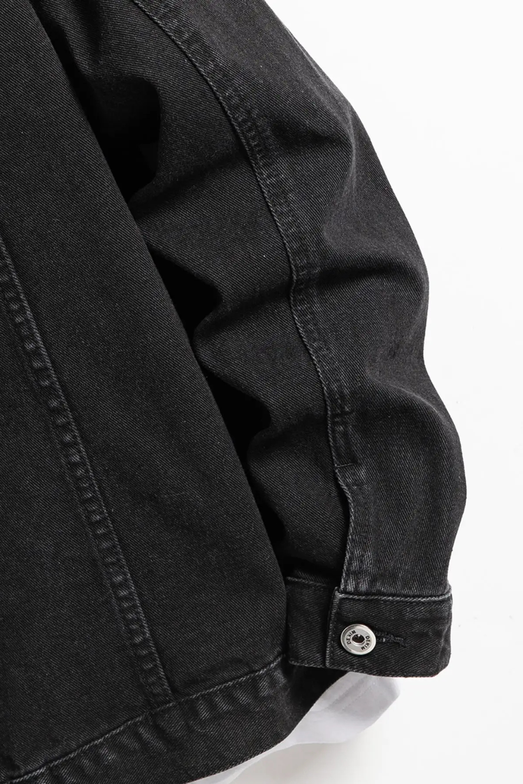 Men's black button-front denim jacket with chest flap pockets