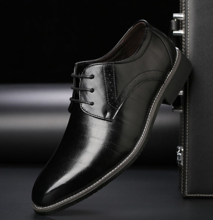 Men's pointed-toe lace-up dress shoe with a polished finish