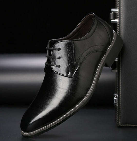 Men's pointed-toe lace-up dress shoe with a polished finish