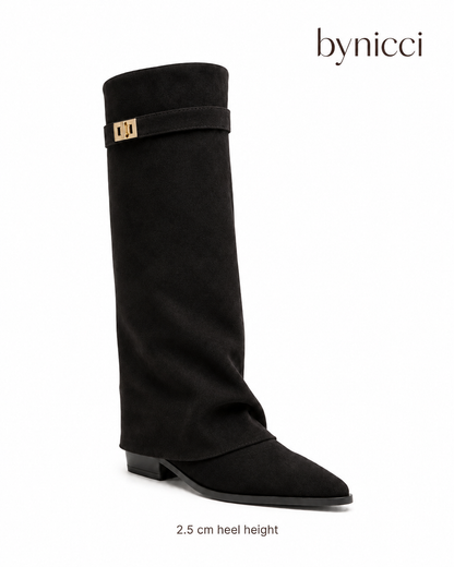Women's black knee-high boots with pointed toes, low heels and gold-tone buckle straps