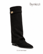 Women's black knee-high boots with pointed toes, low heels and gold-tone buckle straps