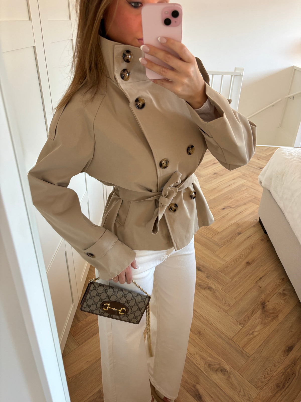 Women's beige cropped trench jacket with high collar and tie belt