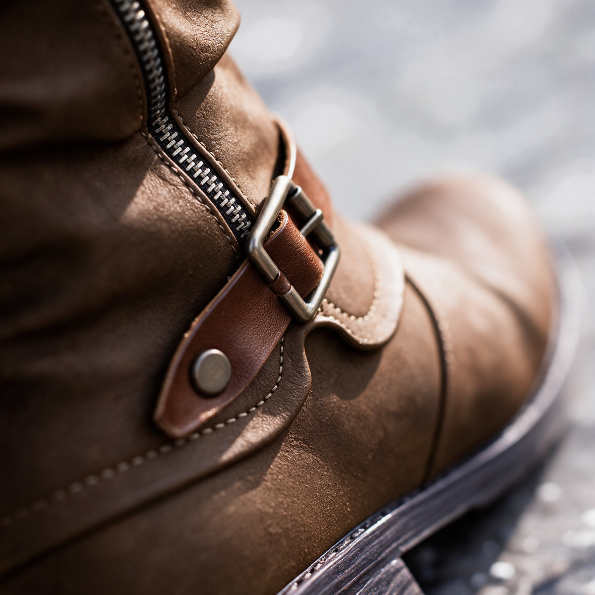 Women's slouch knee-high boots with buckle straps and low block heels