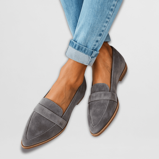 Women's pointed penny loafers with low heels and slip-on styling