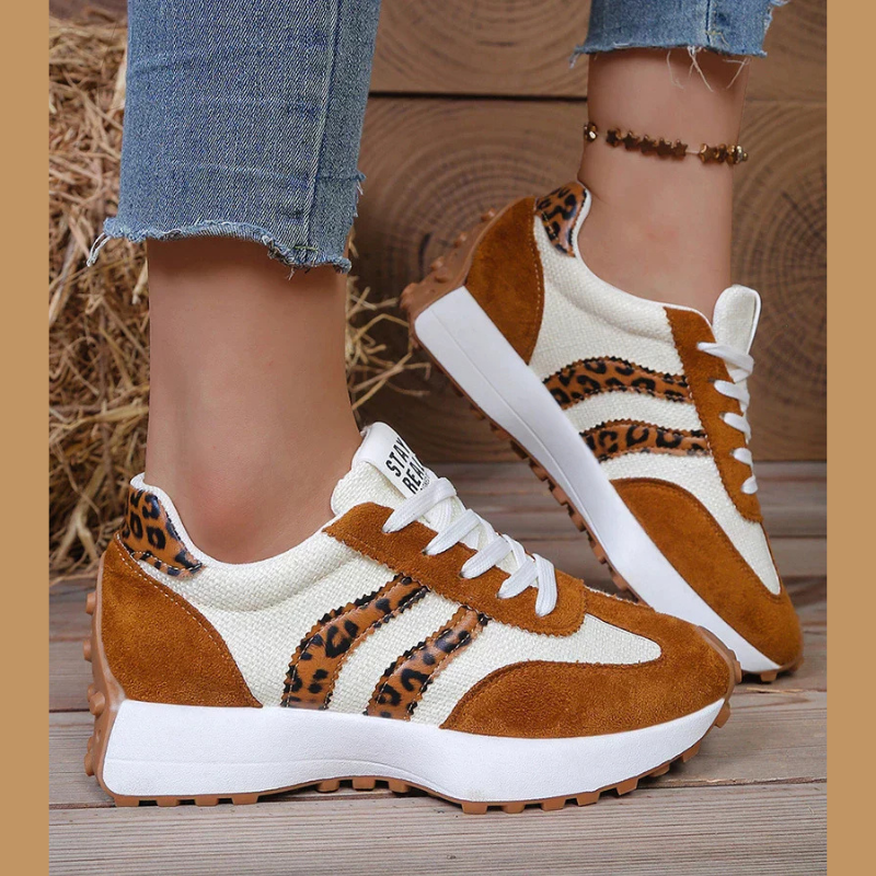 Women's retro lace-up sneakers with striped side panels and flat textured soles