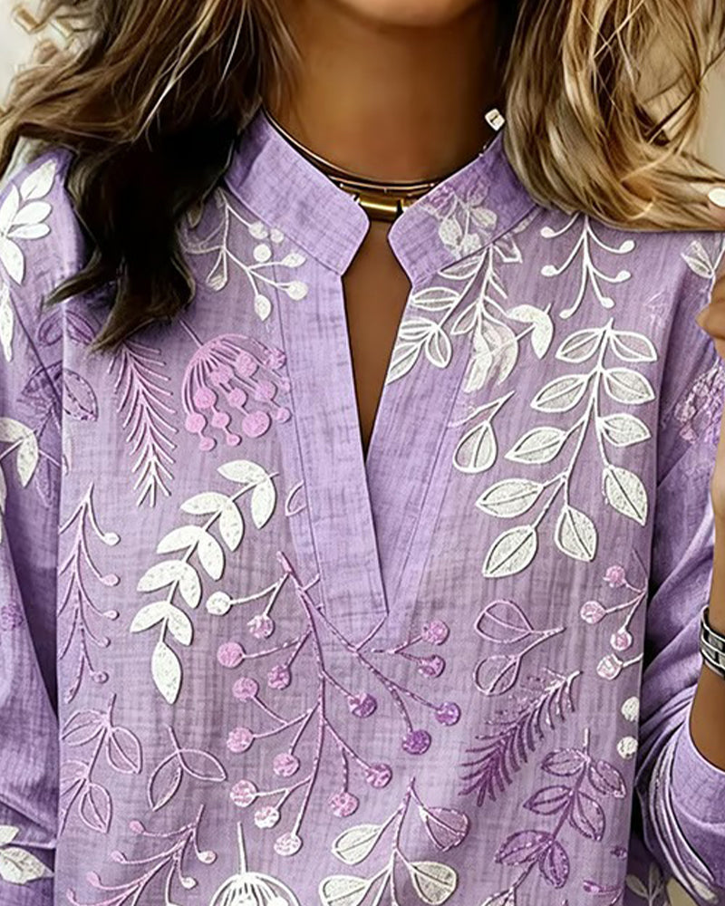 Women's botanical print blouse with notched collar and 3/4 sleeves