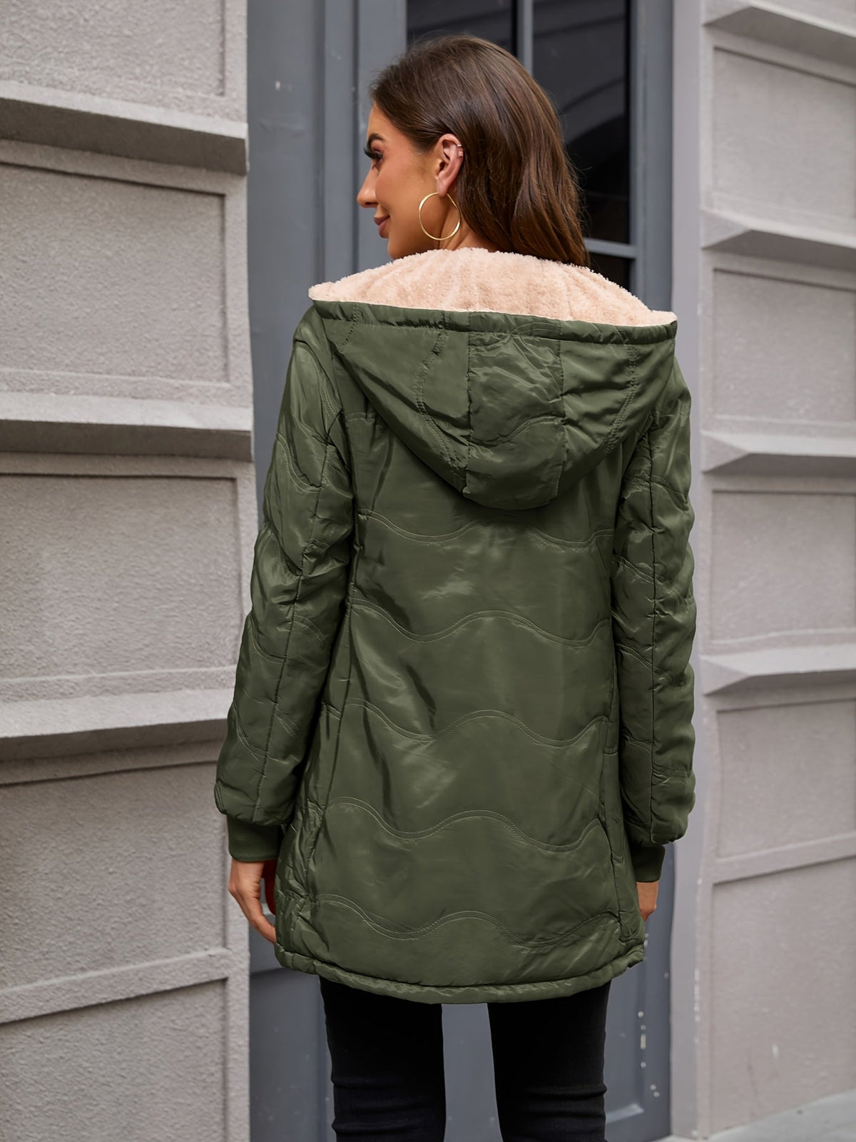 Women's long hooded quilted jacket with fleece-look lining and zip front