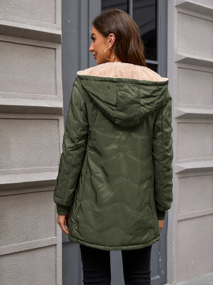 Women's long hooded quilted jacket with fleece-look lining and zip front