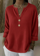 Women's textured waffle henley top with split neckline, buttons and long sleeves