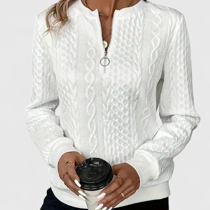 Women's textured cable knit sweater with zip neckline and ribbed trims