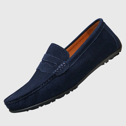 Classic slip-on loafers with penny strap and moc-toe stitching