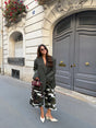 Women's deep green longline blazer with notched lapels and long sleeves