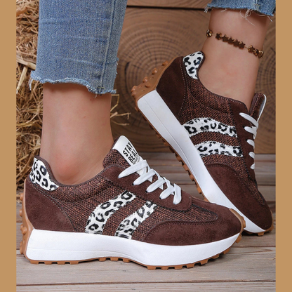 Women's retro lace-up sneakers with striped side panels and flat textured soles
