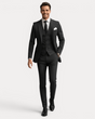Men's three-piece suit with notched lapels, buttoned waistcoat and tailored trousers