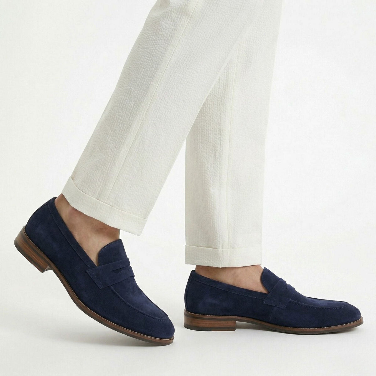 Men's classic penny loafers with textured finish, rounded toe and low heel