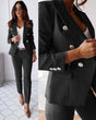 Women's double-breasted trouser suit with tailored blazer, lapels and matching ankle-length trousers