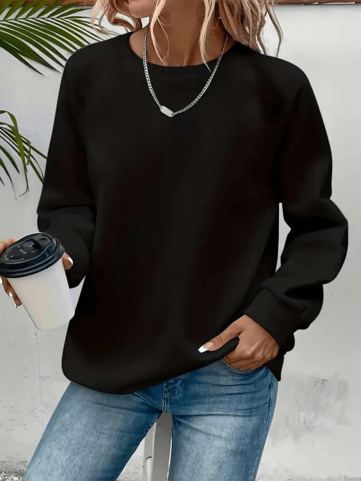 Women's long-sleeve crew neck sweatshirt with ribbed trims
