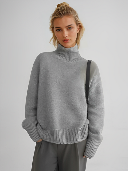 Women's relaxed turtleneck sweater with long sleeves and ribbed trims