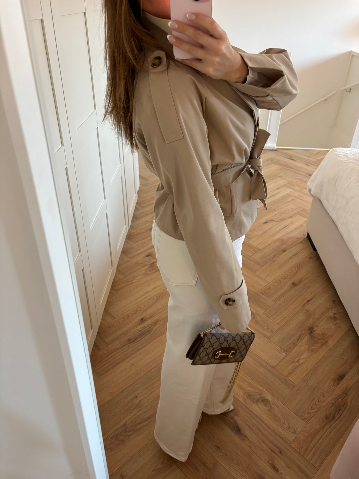 Women's beige cropped trench jacket with high collar and tie belt