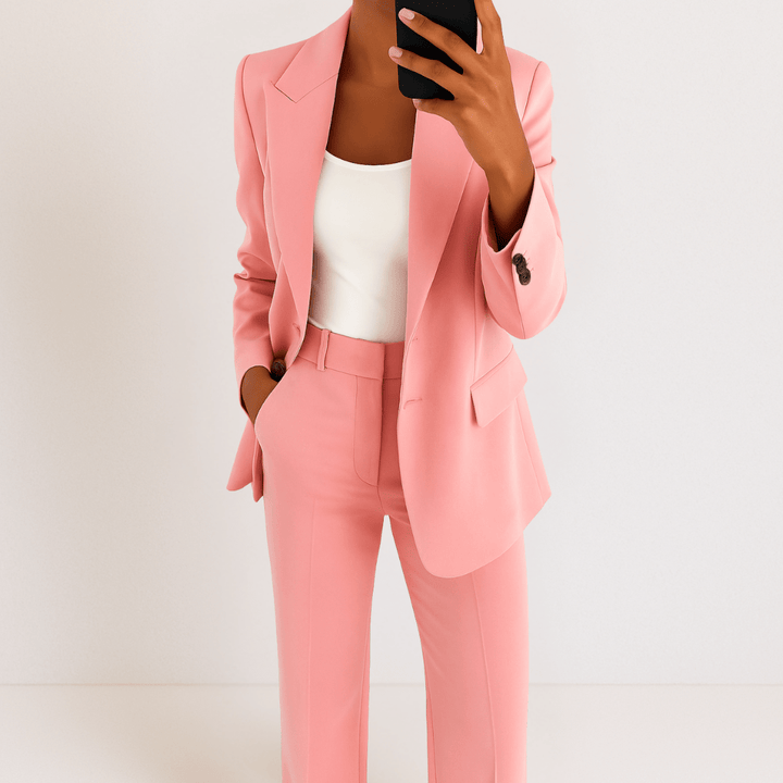 Women's tailored two-piece suit with blazer and straight trousers