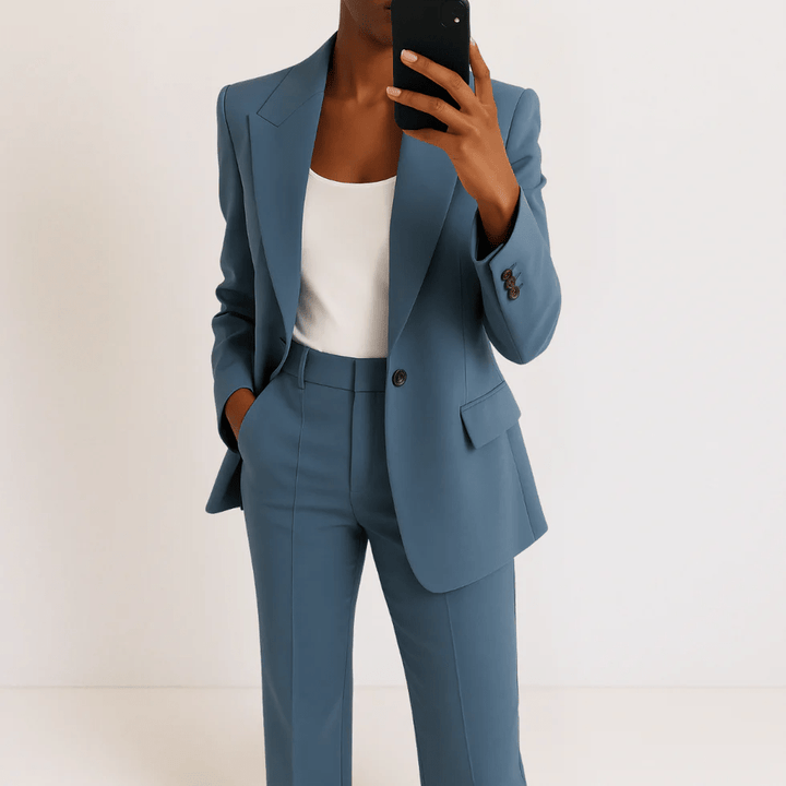 Women's tailored two-piece suit with blazer and straight trousers