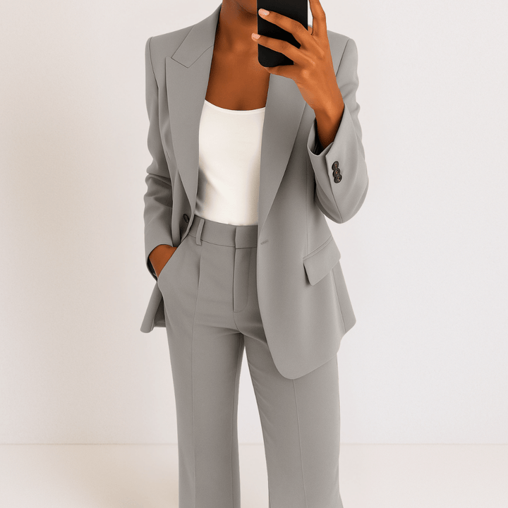 Women's tailored two-piece suit with blazer and straight trousers