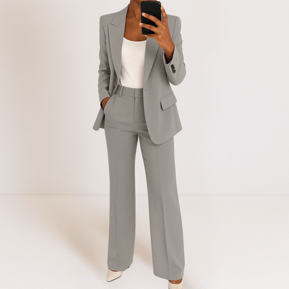 Women's tailored two-piece suit with blazer and straight trousers