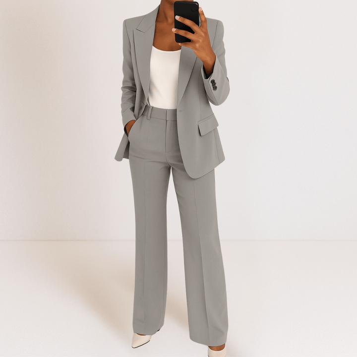 Women's tailored two-piece suit with blazer and straight trousers