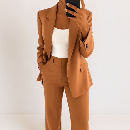 Women's tailored two-piece suit with blazer and straight trousers