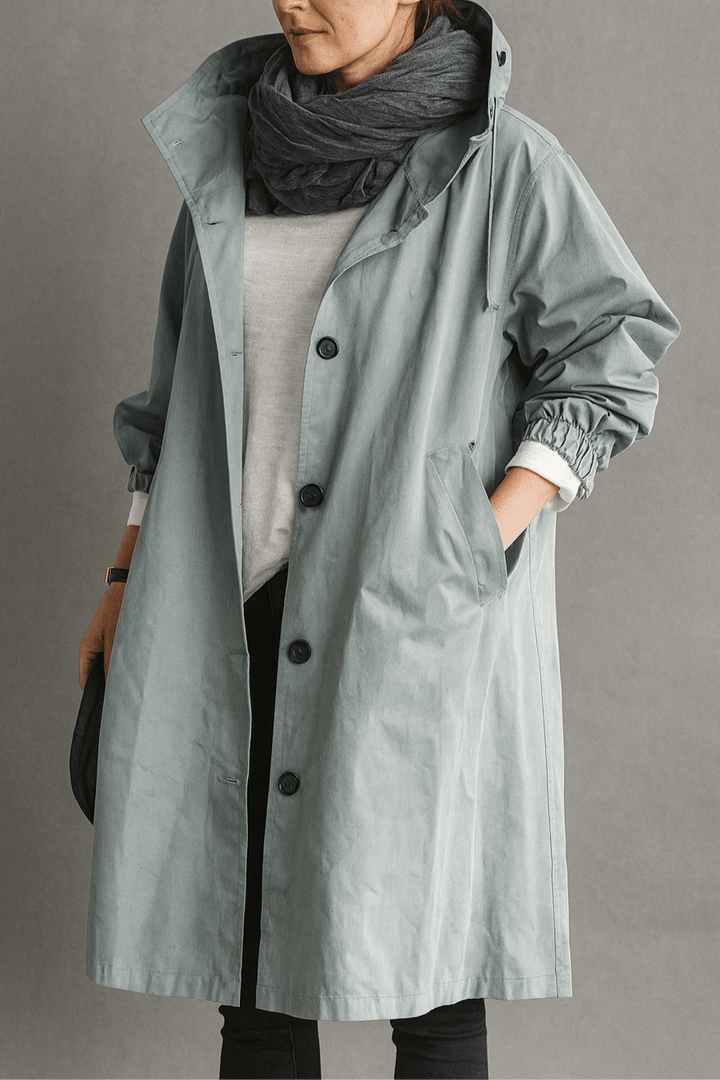 Women's hooded button-front trench coat with pockets