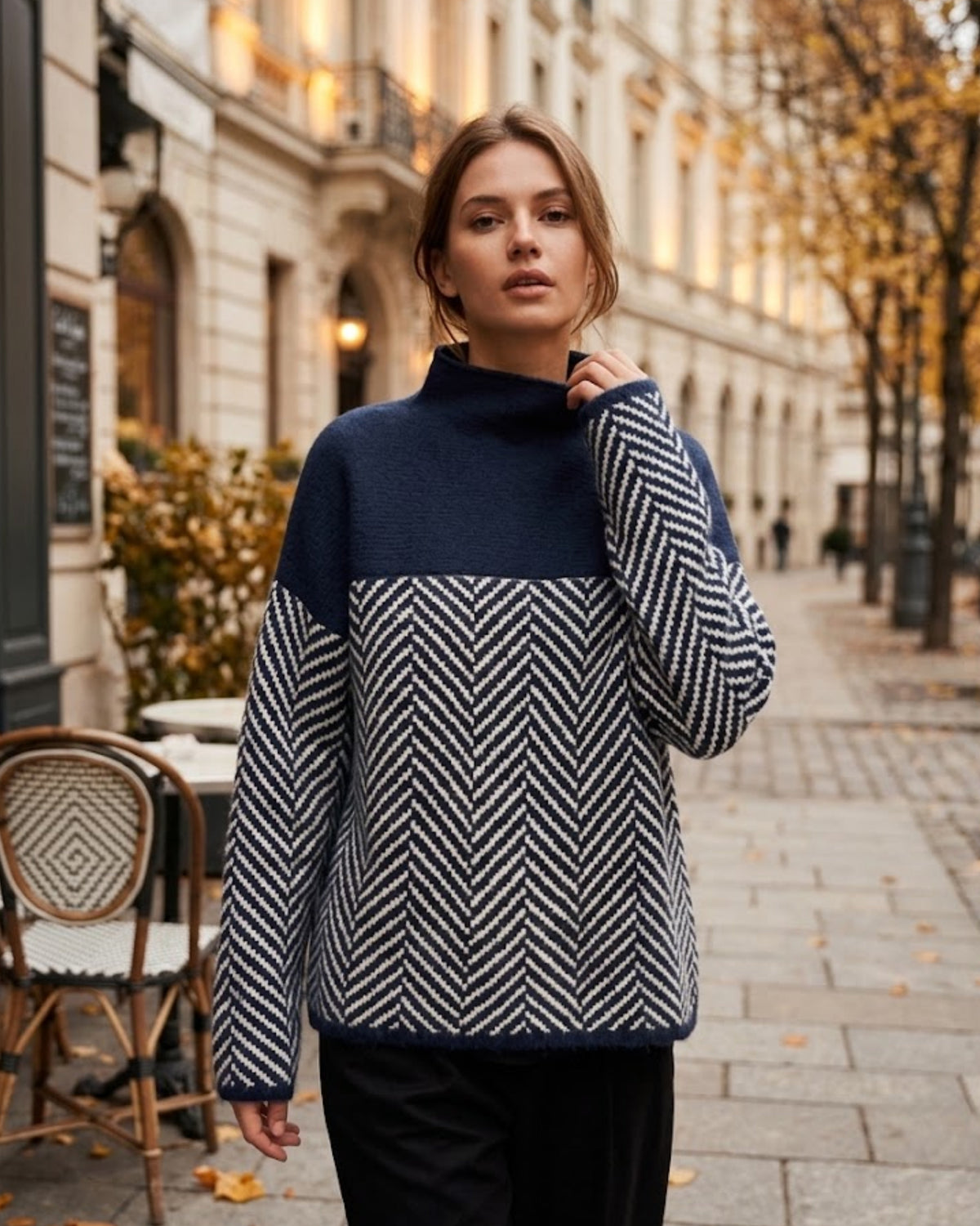 Women's long-sleeve turtleneck sweater with contrasting chevron pattern