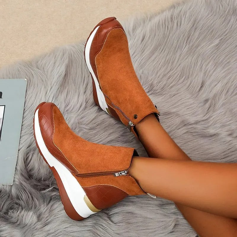 Women's ankle boots with side zippers, textured panels and wedge platform soles