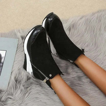 Women's ankle boots with side zippers, textured panels and wedge platform soles