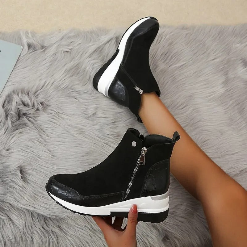 Women's ankle boots with side zippers, textured panels and wedge platform soles