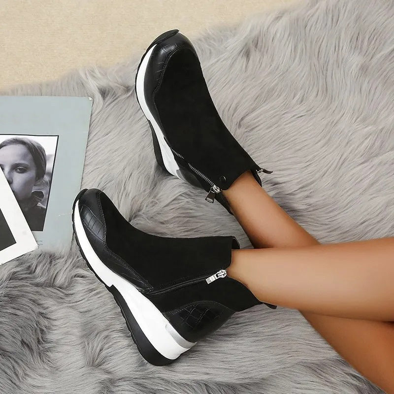 Women's ankle boots with side zippers, textured panels and wedge platform soles
