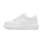 Unisex low-top platform sneakers with lace-up fastening and clean stitched panels