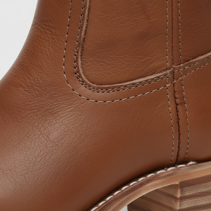 Women's knee-high boots with smooth panels, round toes and low block heels