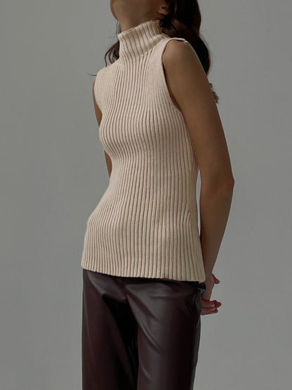 Women's ribbed sleeveless knit top with mock neckline and fitted shape