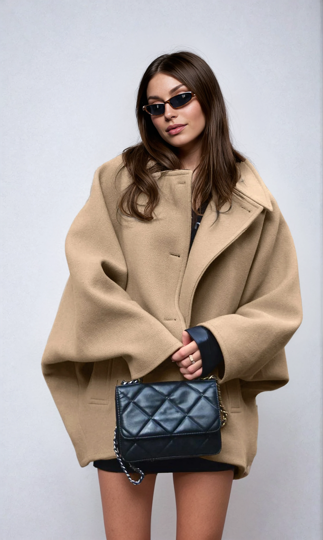 Women's oversized button coat with wide collar and front pockets