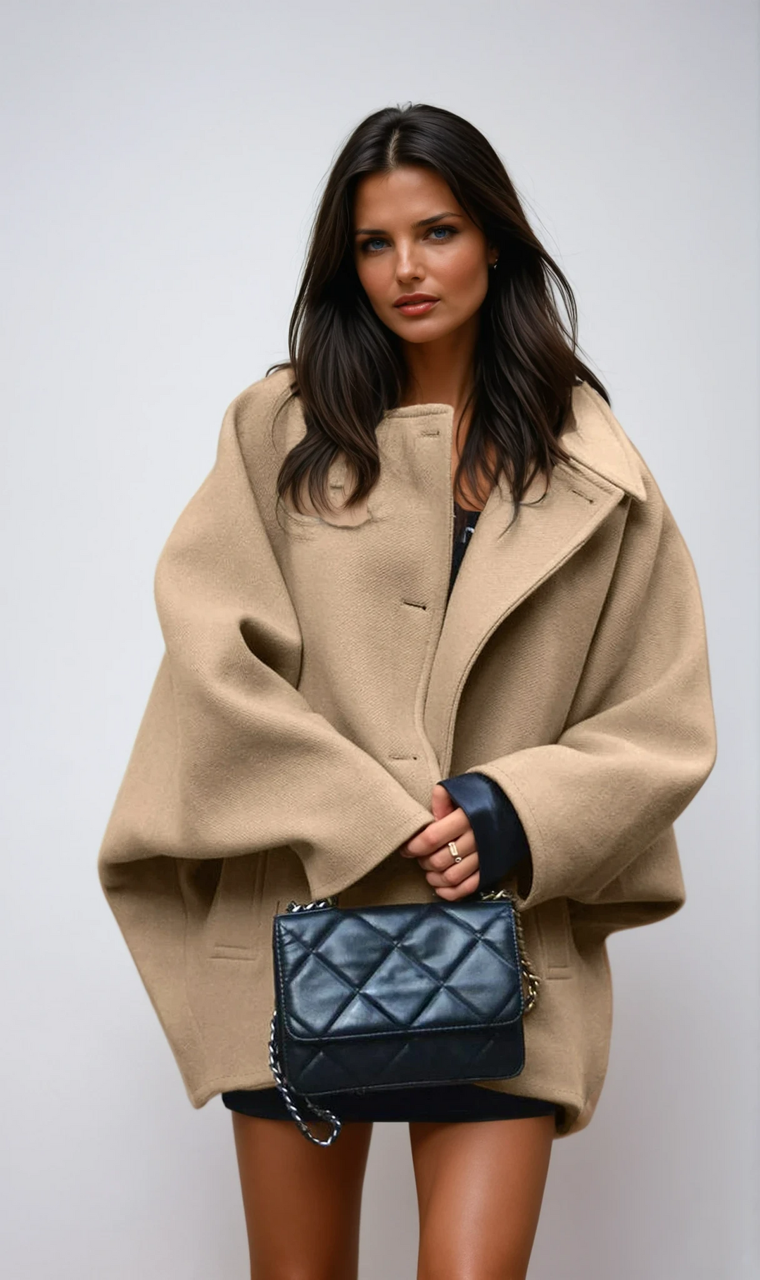 Women's oversized button coat with wide collar and front pockets
