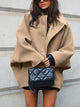 Women's oversized button coat with wide collar and front pockets