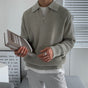 Men's ribbed quarter-zip sweater with pointed collar and long sleeves