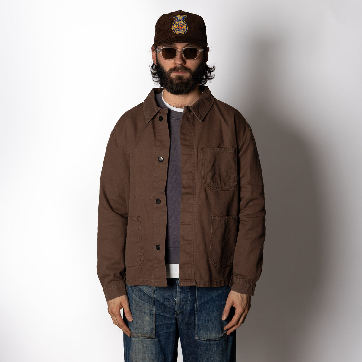 Men's brown utility jacket with shirt collar, long sleeves and four patch pockets