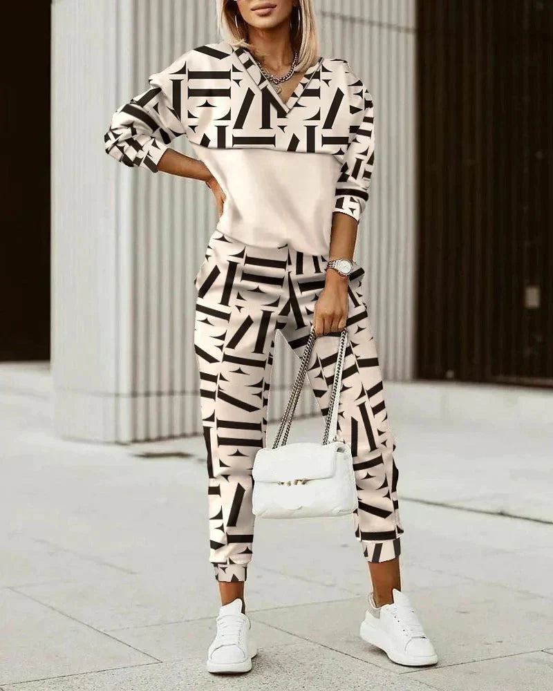 Women's hooded patterned hoodie and jogger set with tapered ankle cuffs