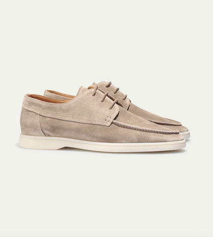 Men's lace-up moc toe loafers shown in navy blue and beige with light soles