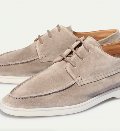 Men's lace-up moc toe loafers shown in navy blue and beige with light soles