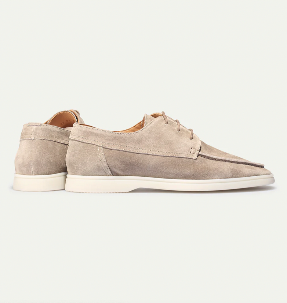 Men's lace-up moc toe loafers shown in navy blue and beige with light soles
