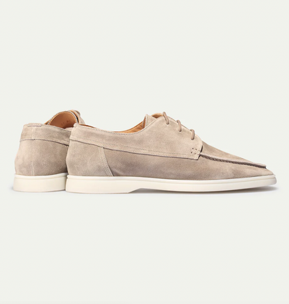 Men's lace-up moc toe loafers shown in navy blue and beige with light soles