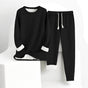 Long-sleeve crew neck sweatshirt and matching drawstring joggers with cuffed hems