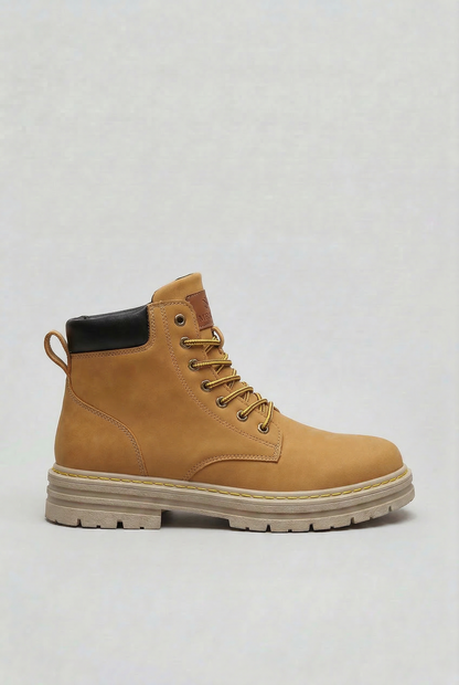 Men's lace-up ankle boot with chunky lug sole, round toe and rear pull tab